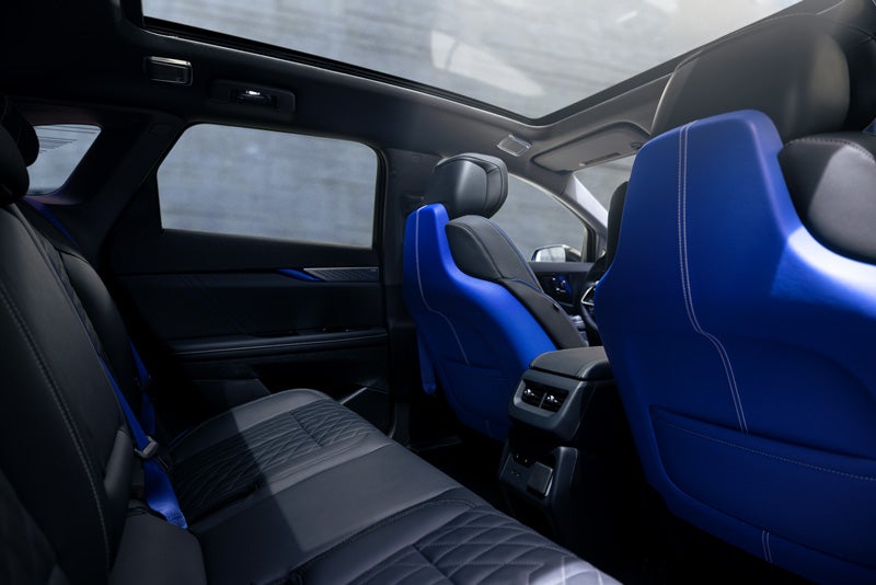 Back Seat View of the 2026 OPTIQ-V Blue Front Seats, Sun Roof, and Interior | Michael Hohl Cadillac in Carson City NV